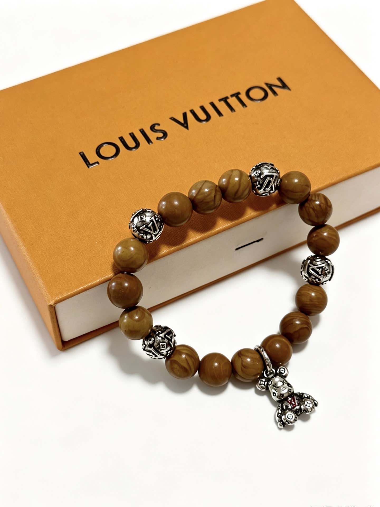 Louis Vuitton Brown Beaded Bracelet with Silver Accents Louis Vuitton Brown Beaded Bracelet with Silver Accents